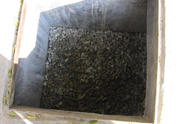 Filter chamber packed with blue metal stones