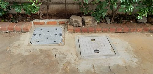 Two finished chambers beside a garden border